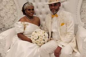 Joyful newlyweds posing for photo at wedding reception - Live music for weddings